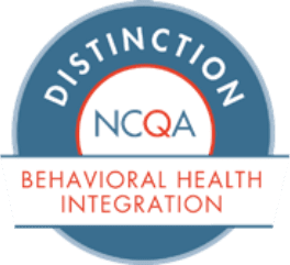 A circular badge with the words Distinction NCQA Behavioral Health Integration, featuring a blue border and white center with red and blue text, symbolizing Montrose Health Care’s commitment to affordable health care.